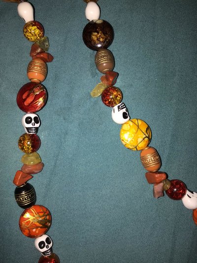 Necklace I Made Yellow Orange Red Brown Black Skulls Closeup.jpg