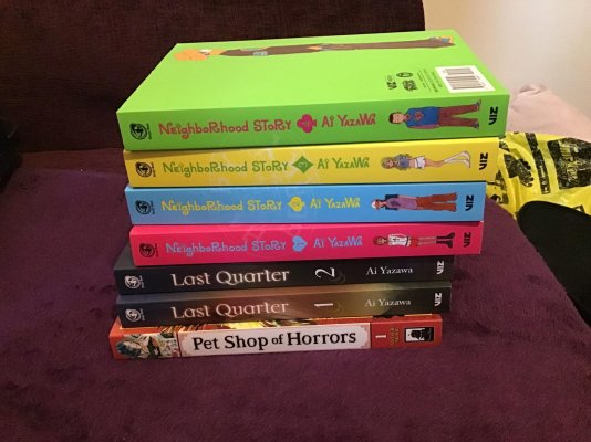 Manga Purchases Spine Stack Neighborhood Story 1-4, Last Quarter 1-2, Pet Shop of Horrors 1.jpg