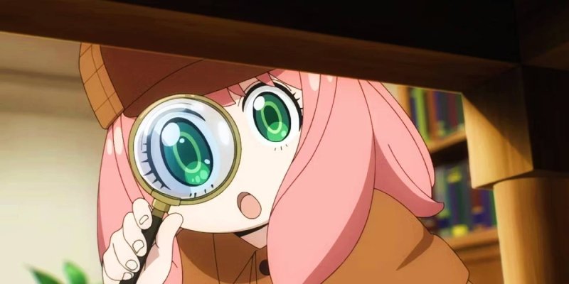anya-holding-a-magnifying-glass.jpg
